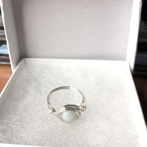 Handmade ring with light green bead